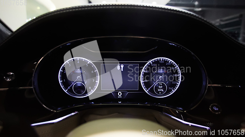 Image of Modern car illuminated dashboard closeup