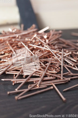 Image of red copper nails