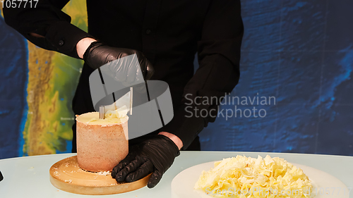 Image of Special cheese knives. The girolle scraper. Making cheese shavin