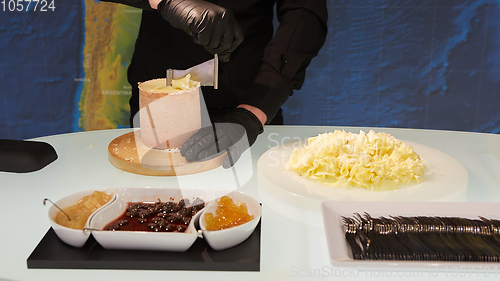 Image of Special cheese knives. The girolle scraper. Making cheese shavin