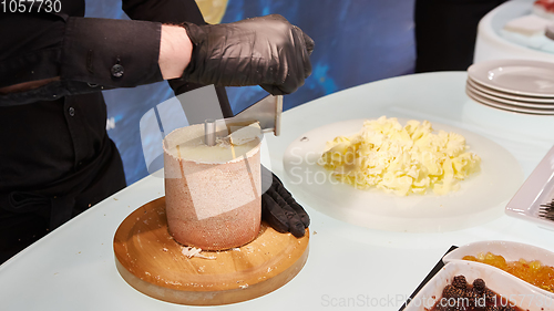 Image of Special cheese knives. The girolle scraper. Making cheese shavin