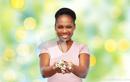 Image of african american woman with alkaline batteries