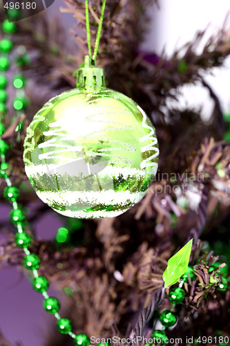 Image of Christmas ornaments on tree.