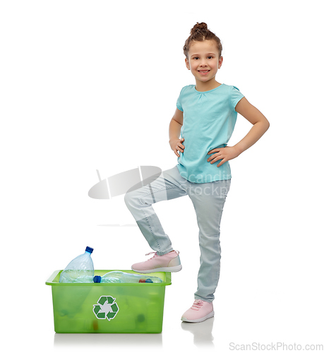 Image of smiling girl sorting plastic waste