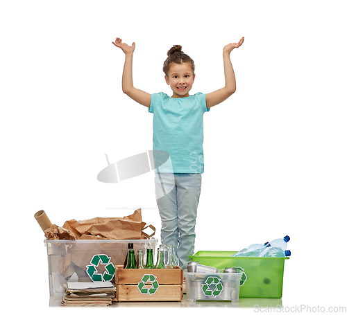 Image of happy girl sorting paper, metal and plastic waste