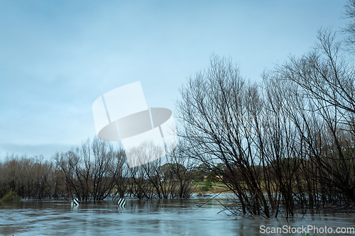 Image of Flood waters engulf large areas included  this road