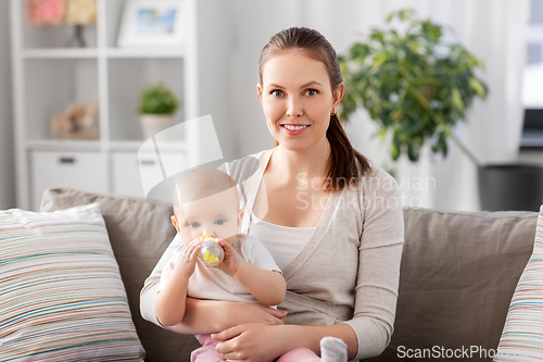 Image of close up of mother with baby drinking water