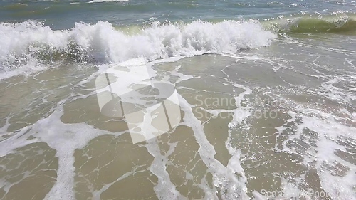 Image of Powerful ocean waves crashing on a coast. Extreme stormy ocean waves splashing on a Beach