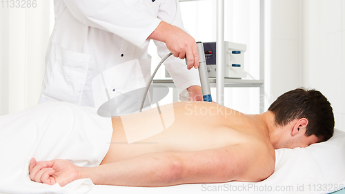 Image of Shock wave therapy. The magnetic field, rehabilitation.