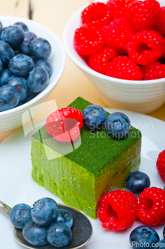 Image of green tea matcha mousse cake with berries