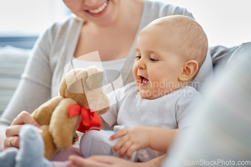 Image of close up of mother with little baby at home