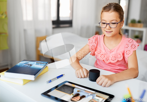 Image of girl with smart speaker learning online at home