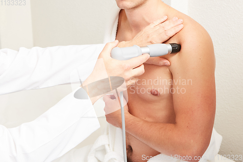 Image of Shock wave therapy. The magnetic field, rehabilitation.