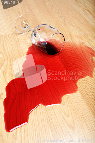 Image of wine spill on hardwood floor