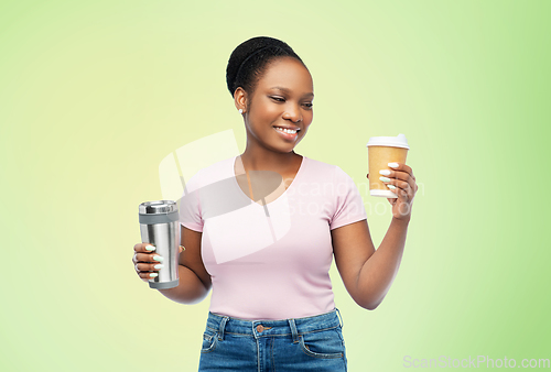 Image of woman with coffee cup and tumbler for hot drinks