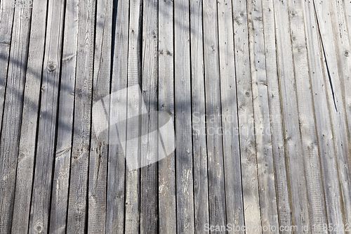 Image of damaged old pine shed