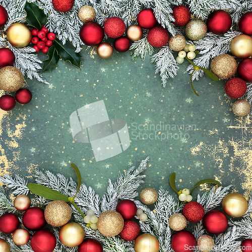 Image of Christmas Tree Decorations and Flora Background Border