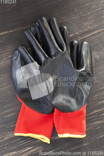 Image of black and red protective gloves