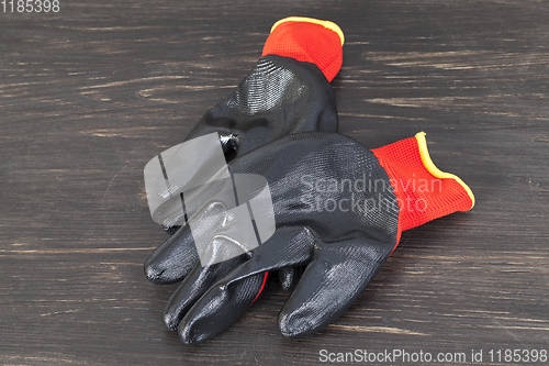 Image of black and red protective gloves