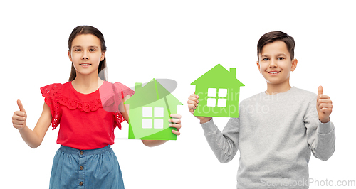 Image of children with green house icons showing thumbs up