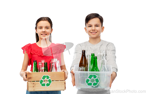 Image of smiling children with boxes sorting glass waste