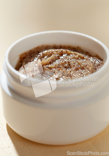 Image of close up of natural body scrub in jar
