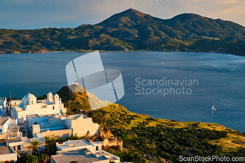 Image of View of Plaka village on Milos island on sunset in Greece