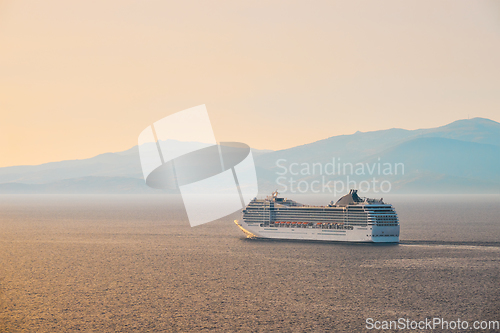 Image of Cruise ship in Aegean sea on sunset