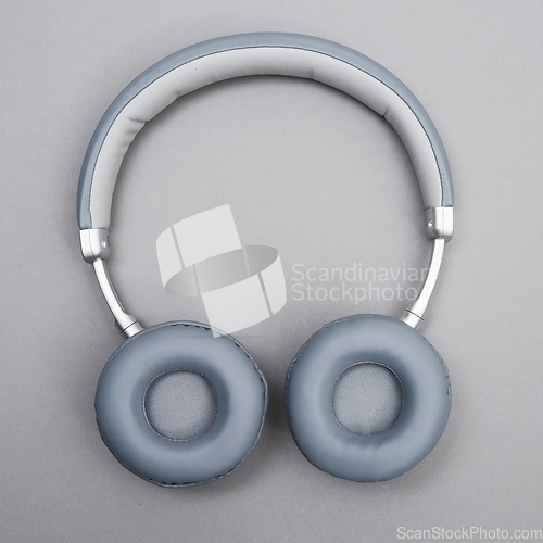 Image of wireless headphones on a neutral background