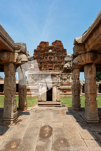 Image of Mandapa pillared outdoor hall and gopura tower in Achyutaraya Temple in Hampi