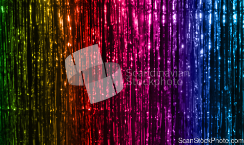 Image of background of foil fringe in rainbow colors