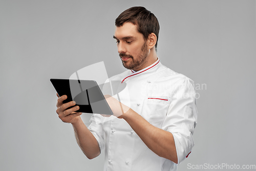 Image of male chef with tablet pc computer