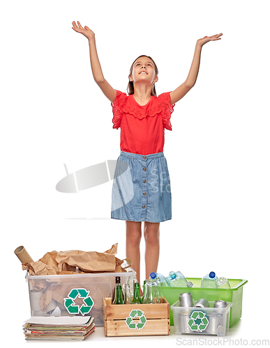 Image of happy girl sorting paper, metal and plastic waste