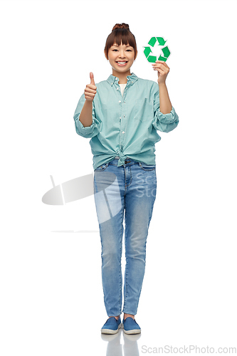 Image of smiling asian woman holding green recycling sign