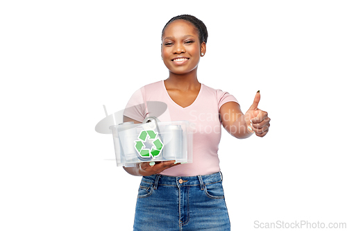 Image of african american woman sorting metallic waste