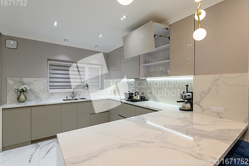 Image of Luxury white modern marble kitchen in studio space