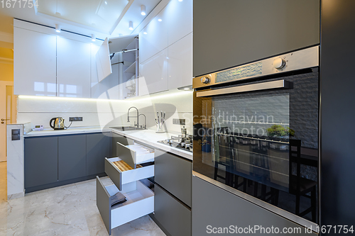 Image of Luxury white and dark grey modern kitchen interior