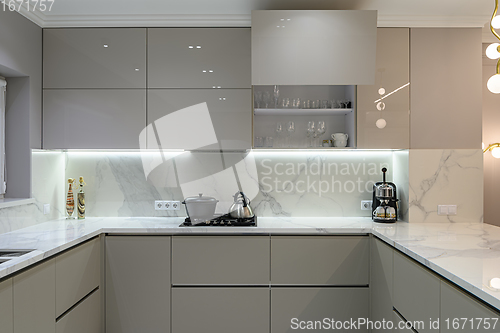 Image of Luxury white modern marble kitchen in studio space