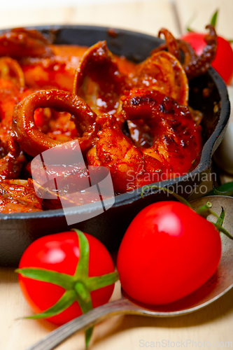 Image of fresh seafoos stew on an iron skillet