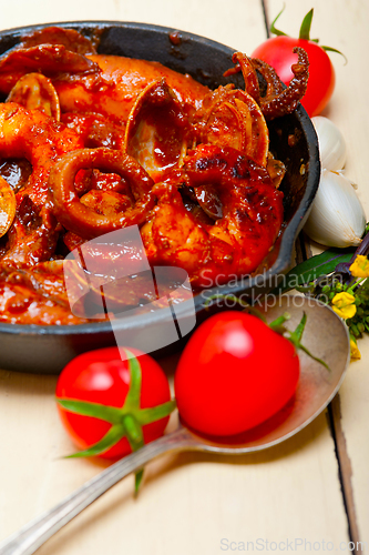 Image of fresh seafoos stew on an iron skillet