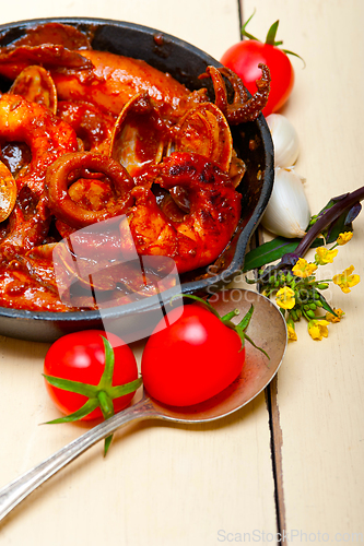 Image of fresh seafoos stew on an iron skillet