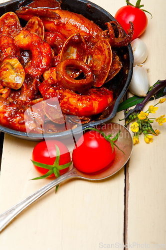 Image of fresh seafoos stew on an iron skillet