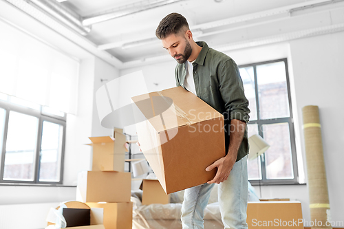 Image of man with boxes moving to new home