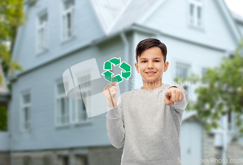 Image of happy boy with recycling sign pointing to you