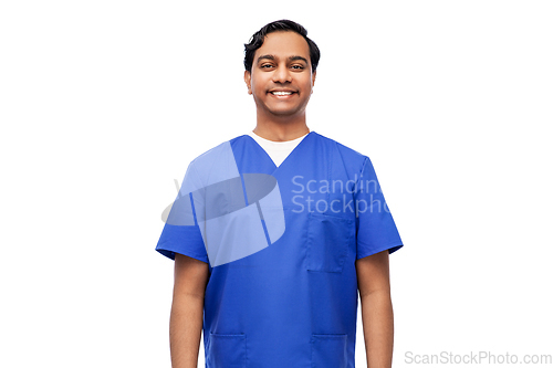 Image of happy indian doctor or male nurse in blue uniform