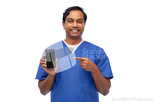 Image of smiling doctor or male nurse with smartphone