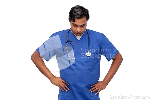 Image of stressed doctor or male nurse in blue uniform