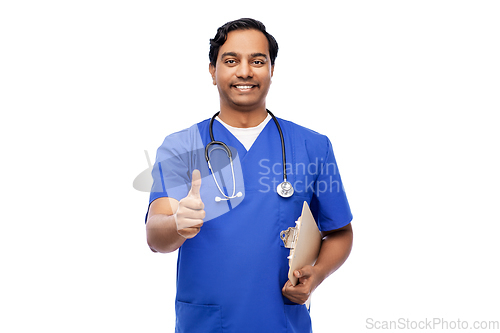 Image of smiling doctor or male nurse showing thumbs up