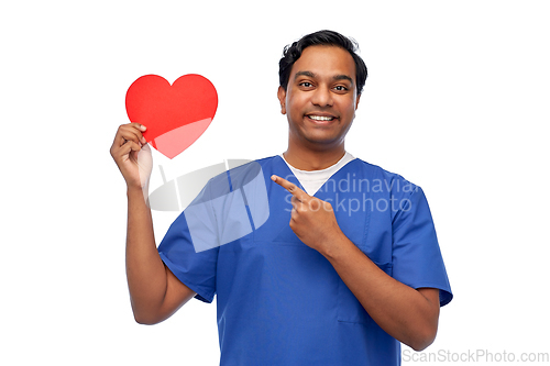 Image of smiling male doctor with red heart on clipboard