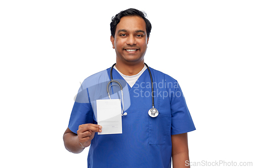 Image of indian doctor or male nurse with prescription